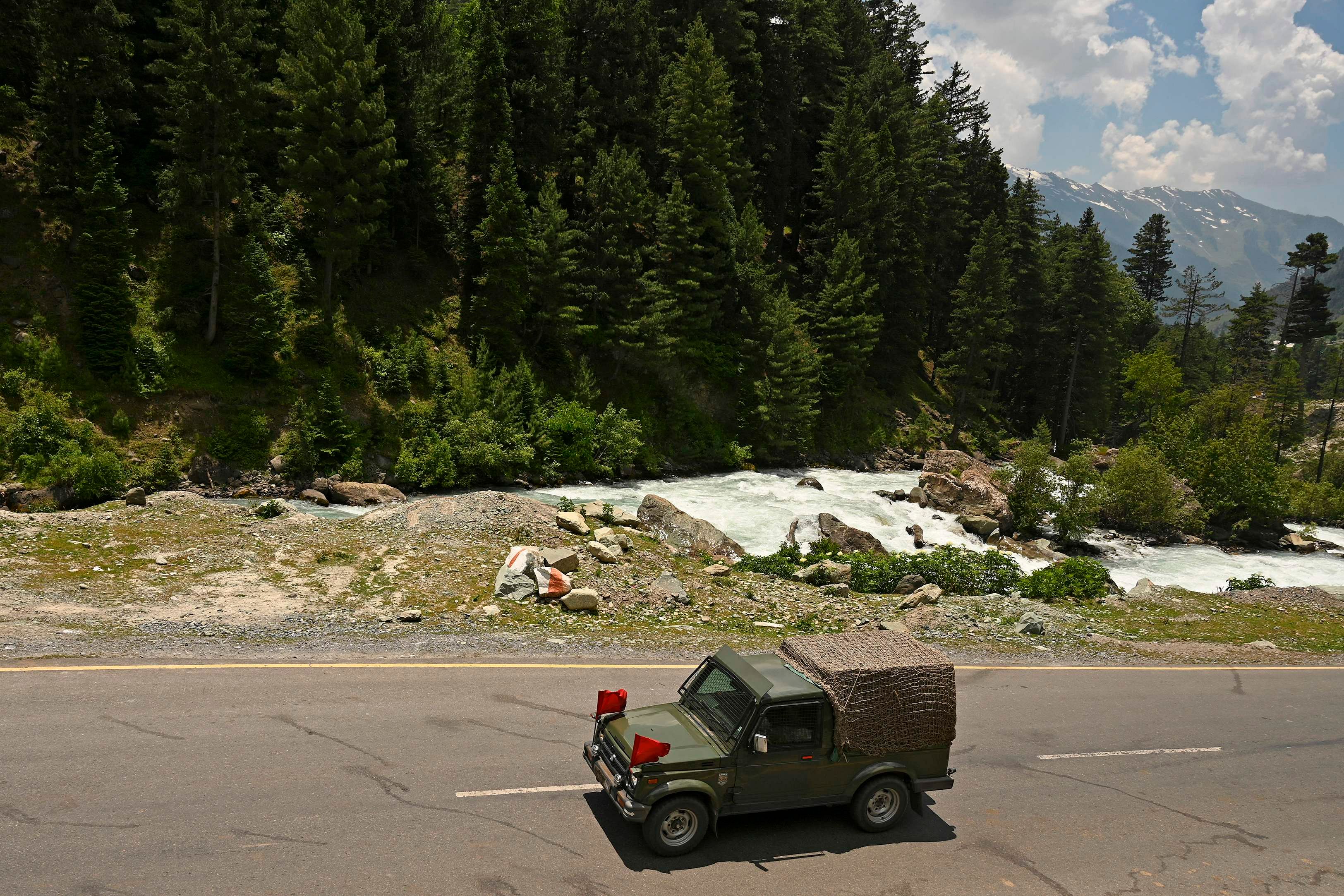 An Indian army vehicle makes way towards Leh, bordering China, in Gagangir on June 17, 2020. (AFP Photo)