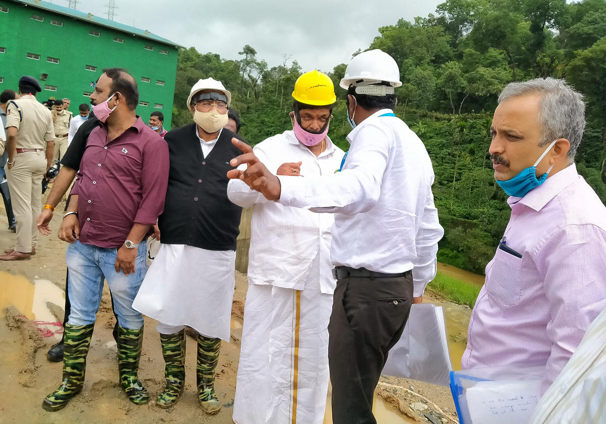 District In-charge Minister K Gopalaiah inspects the Yettinahole project works, at Kappalli village in Sakleshpur taluk of Hassan district on Thursday.