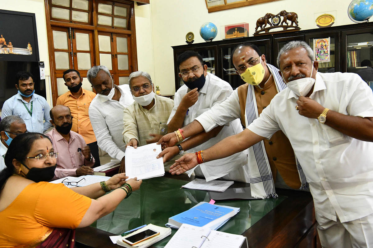 BJP candidate for the Legislative Council election Sunil Vallyapure files his nomination papers in Bengaluru on Thursday. Deputy CM Govind Karjol, BJP leader Aravind Limbavali, ministers S T Somashekar and Byrathi Basavaraj are seen.