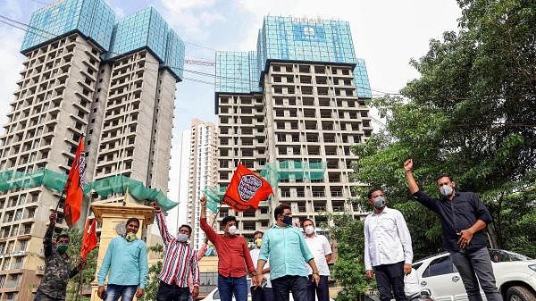 MNS party workers stage a protest outside a building, constructed by a Chinese construction firm, against the killing of Indian soldiers by Chinese troops, at Dhokali in Thane, Friday, June 19, 2020. Credit: PTI Photo