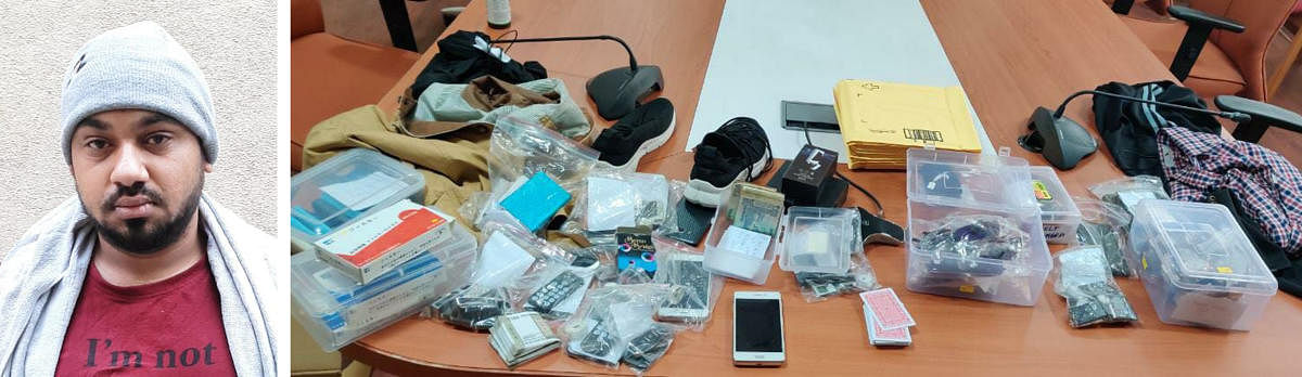Imran and the host of devices seized from his possession. DH PHOTO