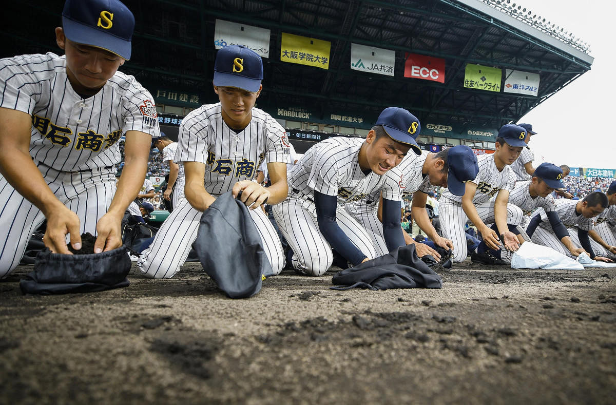 Japanese playing baseball (AP Photo)
