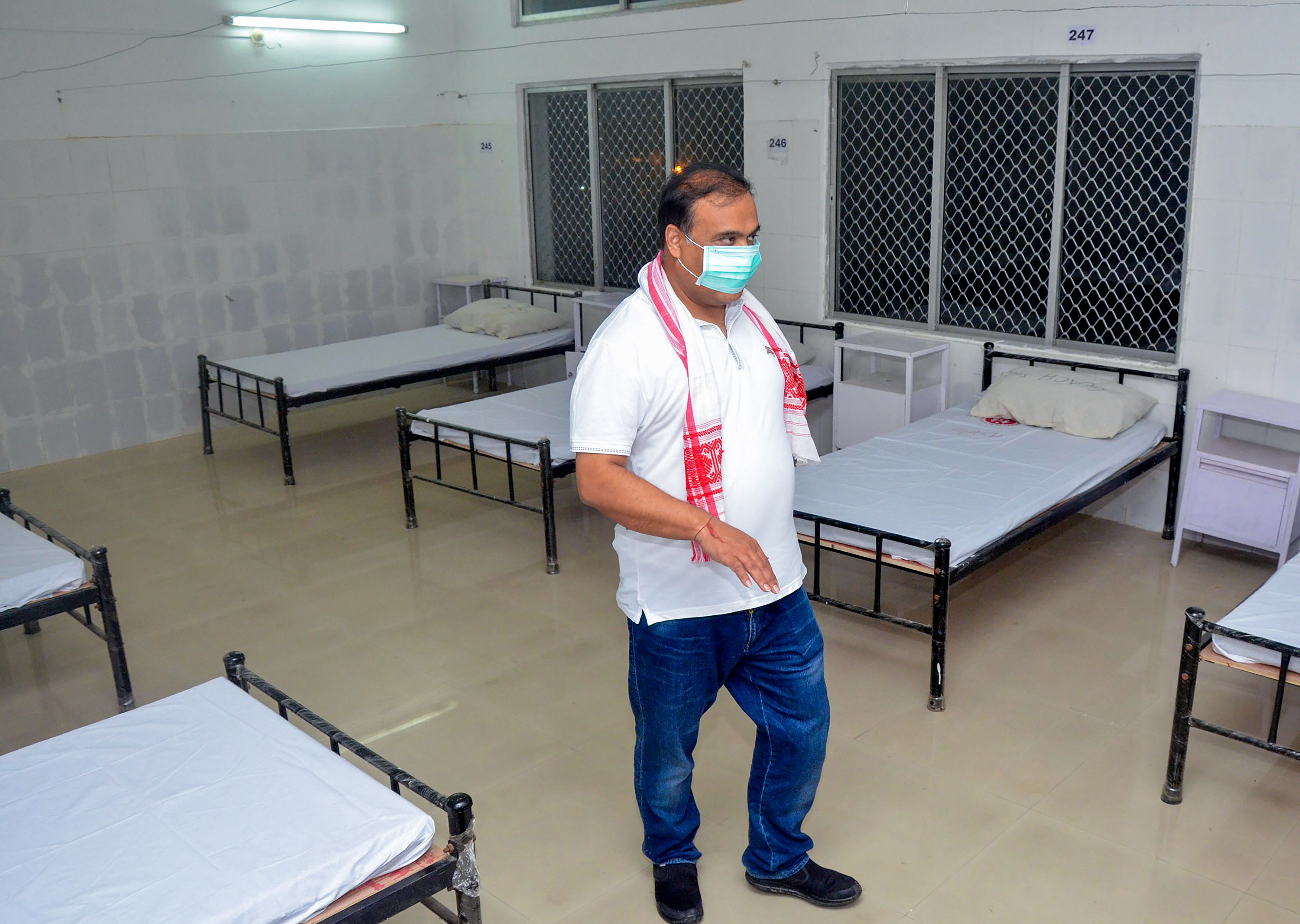 Assam State Finance, Health and Family Welfare Minister Himanta Biswa Sarma wearing a face mask reviews a quarantine centre setup for COVID19 patients, at Jalukbari in Guwahati. (PTI Photo)