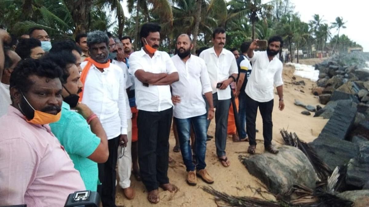 District In-charge Minister Kota Srinivas Poojary inspects the sea erosion affected areas in Ucchila-Someshwara.