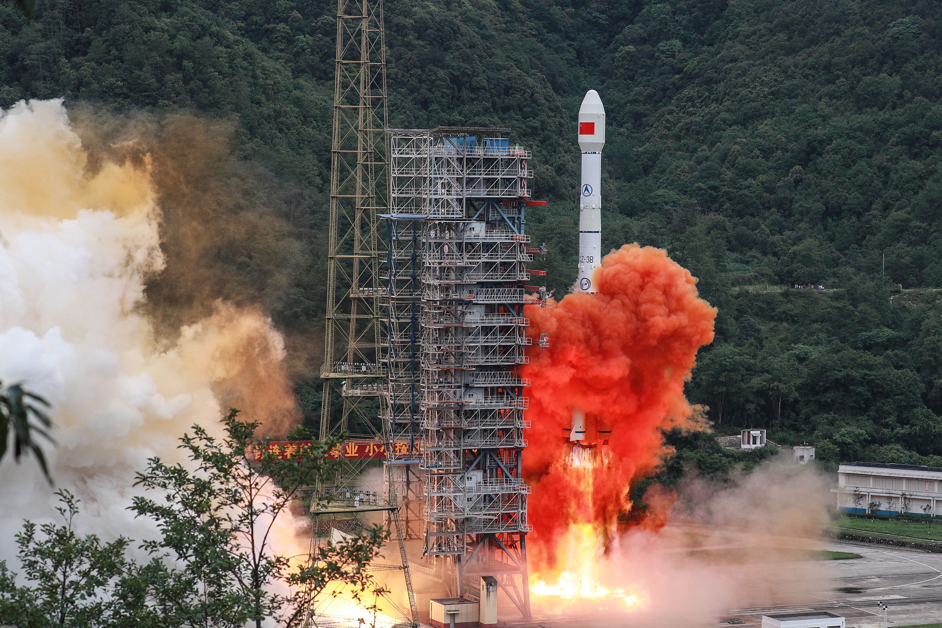 A Long March 3B rocket carrying the Beidou-3GEO3 satellite lifts off from the Xichang Satellite Launch Center in Xichang in China's southwestern Sichuan province on June 23, 2020. - China on June 23 launched the final satellite in its homegrown geolocation system designed to rival the US GPS network, marking a major step in its race for market share in the lucrative sector. (Photo by AFP)
