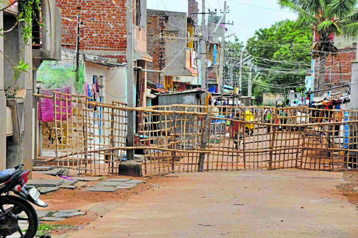 The Betageri settlement area in Gadag was sealed after Covid-19 cases were reported from the locality on Monday. DH Photo