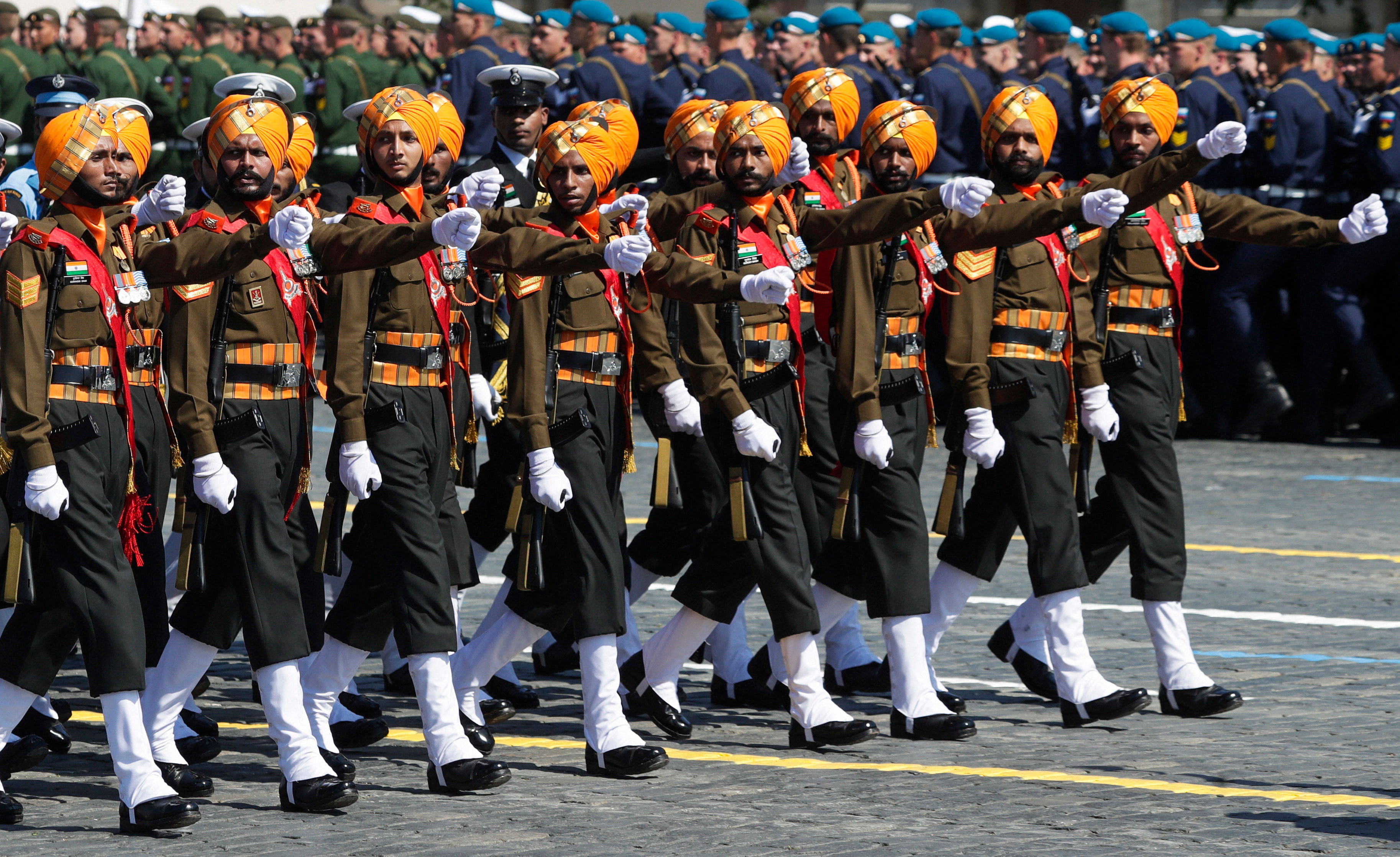 Solders of Indian Armed Forces march in Red Square during the Victory Day military parade marking the 75th anniversary of the Nazi defeat in WWII, in Moscow, Russia, Wednesday, June 24, 2020. The Victory Day parade normally is held on May 9, the nation's most important secular holiday, but this year it was postponed due to the coronavirus pandemic. Credit: AP/PTI Photo