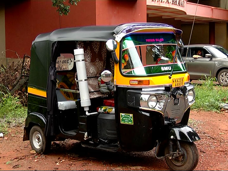 The autorickshaw equipped with handwash and sanitiser. Credit: DH Photo