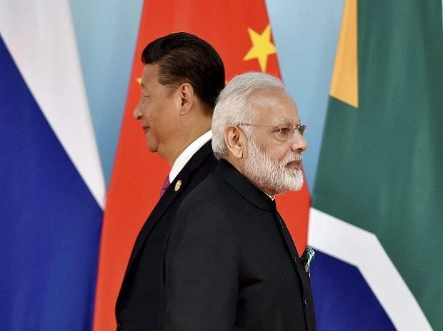Chinese President Xi Jinping and Indian PM Narendra Modi at the BRICS summit, 2017. Credit: AP/ PTI