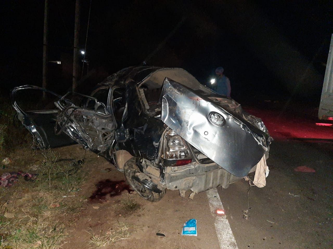   Photo: The car that met with an accident at  Karthikere in Chikkamagaluru. DH Photo