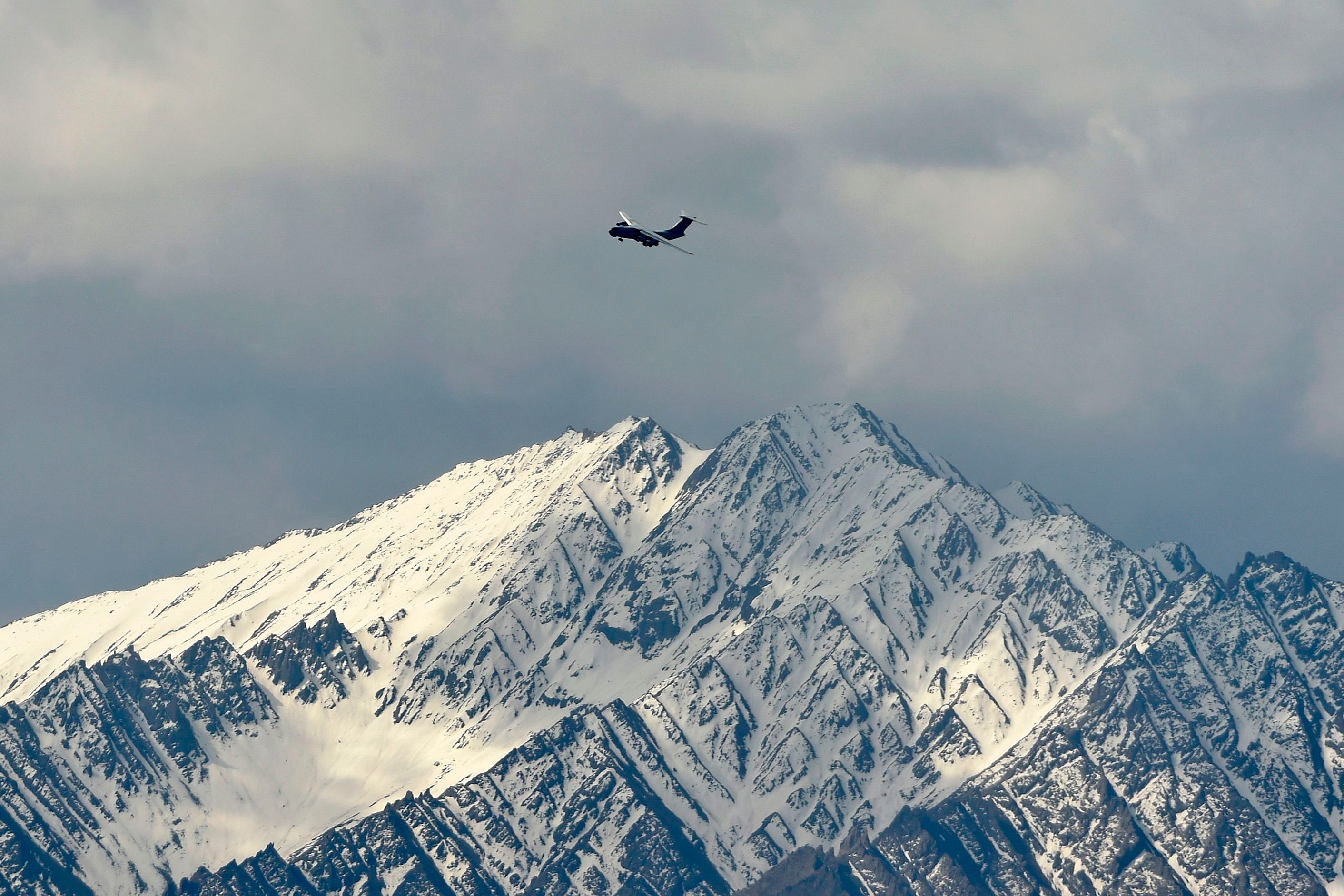 An Indian Air Force aircraft flies over Leh, the joint capital of the union territory of Ladakh. Credits: AFP Photo
