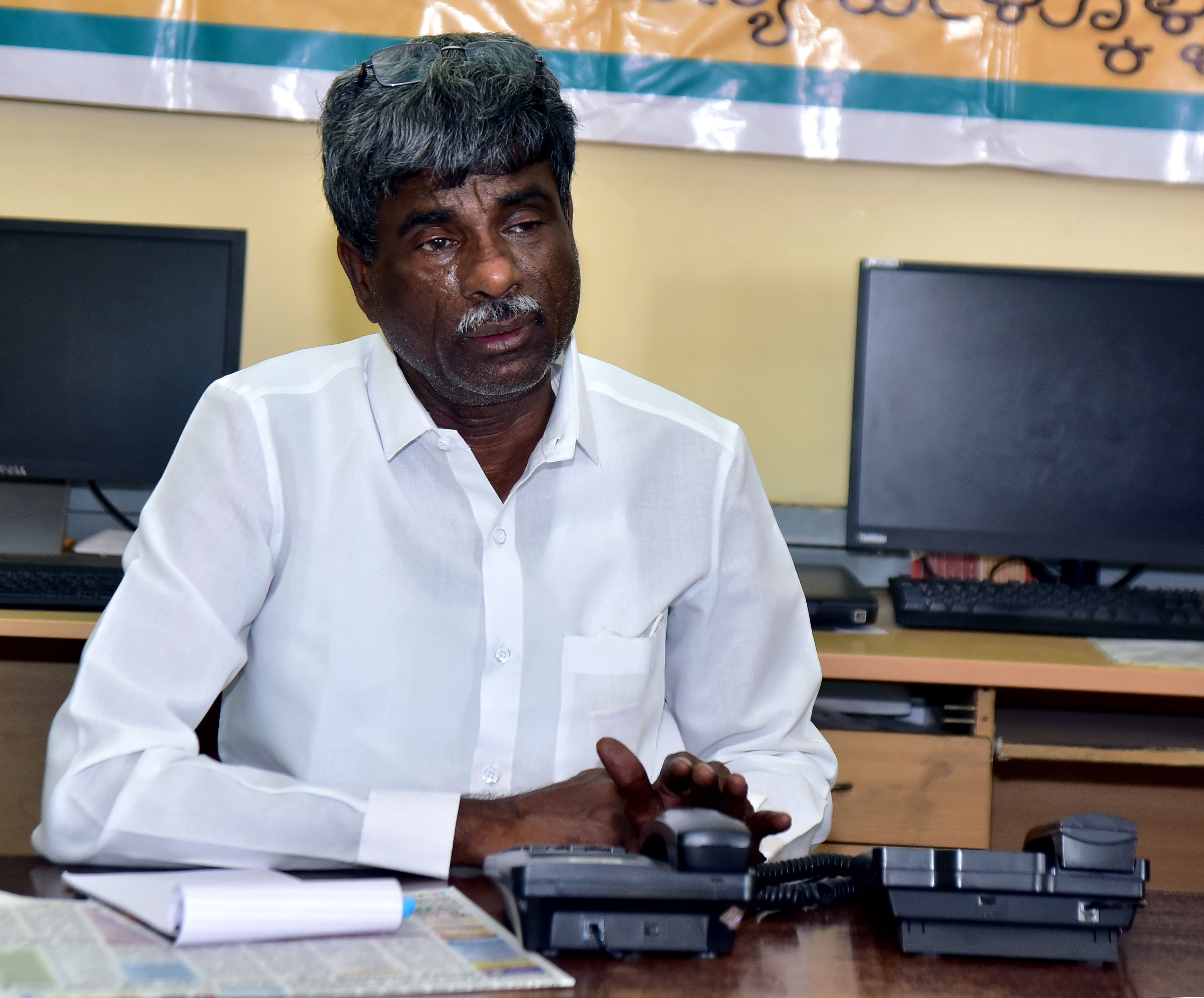 District In-charge Minister Kota Srinivas Poojary. Credits: DH Photo