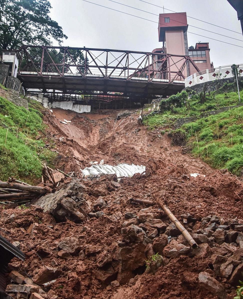 Debris after a massive landslide below Raj Bhawan due to incessant rainfall, in Guwahati (PTI Photo)