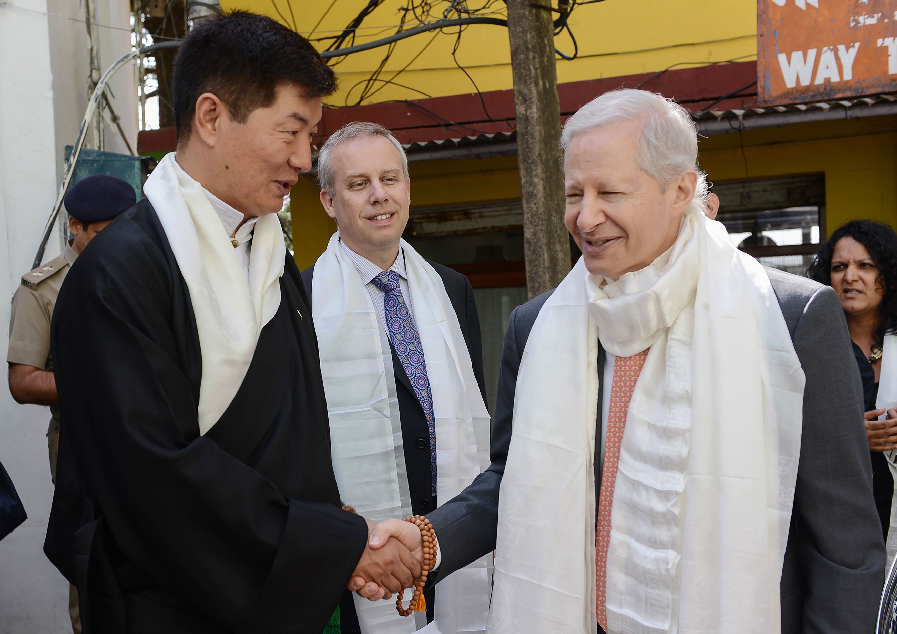US Ambassador to India Kenneth Juster shakes hands with President of Central Tibetan Administration Lobsang Sangay. Credit: AFP Photo