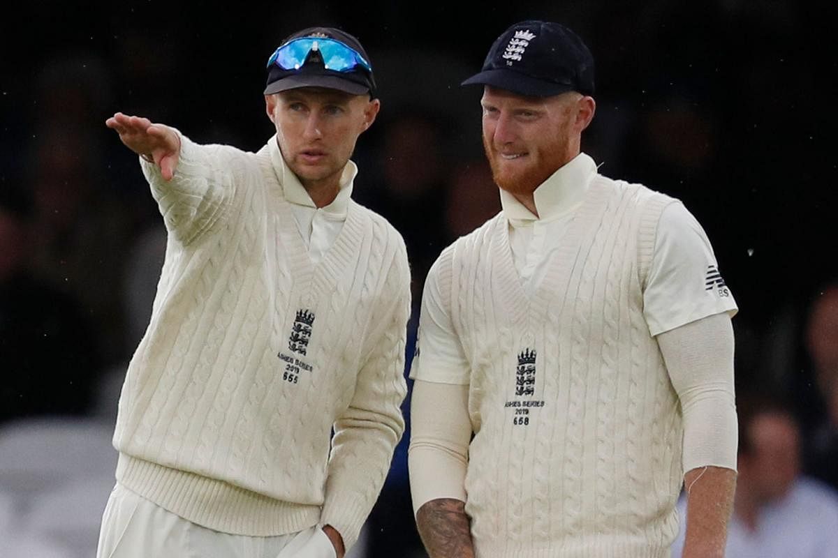 England's captain Joe Root (L) and Ben Stokes. Credit: AFP