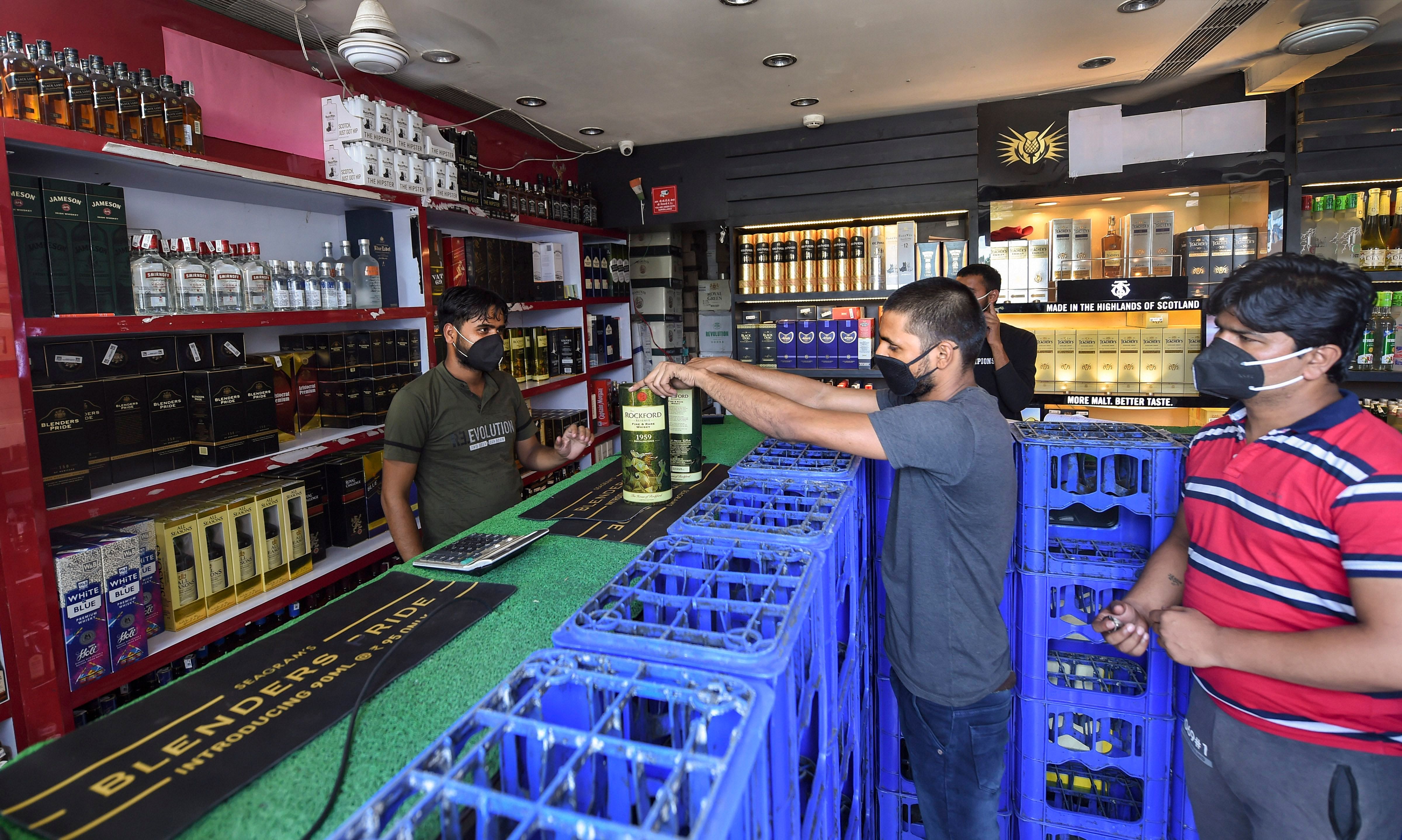 Compared to the price of liquor in neighbouring states, it is on the higher side in West Bengal, which may lead to illegal trading of alcoholic beverages, Giri said. Credit: PTI Photo