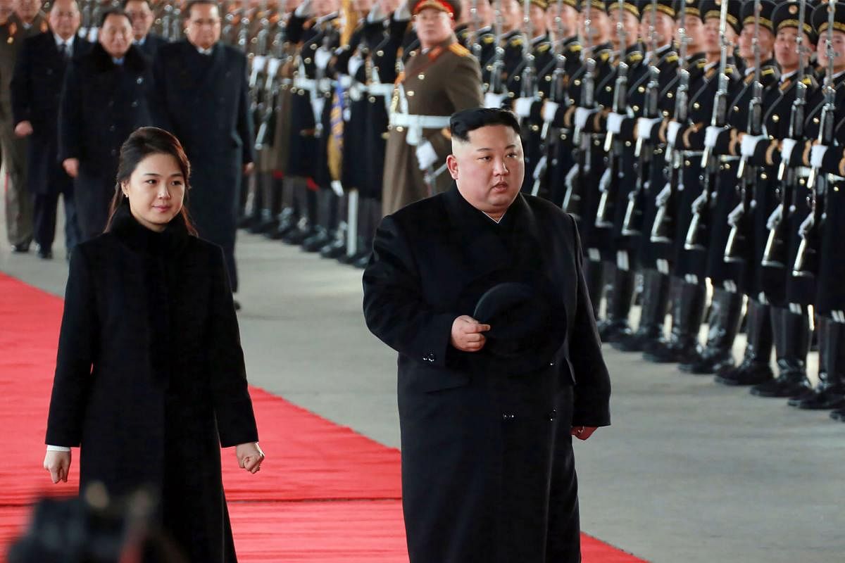 Kim Jong-un with wife Ri Sol Ju. AFP/file/KCNA via KNS