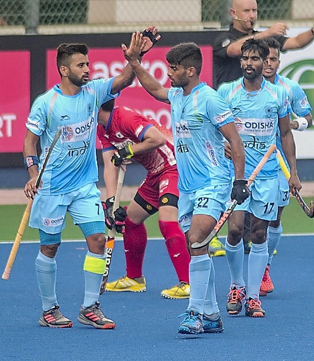 Hockey player Varun Kumar celebrates after converting a penalty corner as India defeats Japan 2-0 in the first match of Sultan Azlan Shah Cup hockey tournament, in Ipoh Malaysia. PTI/file