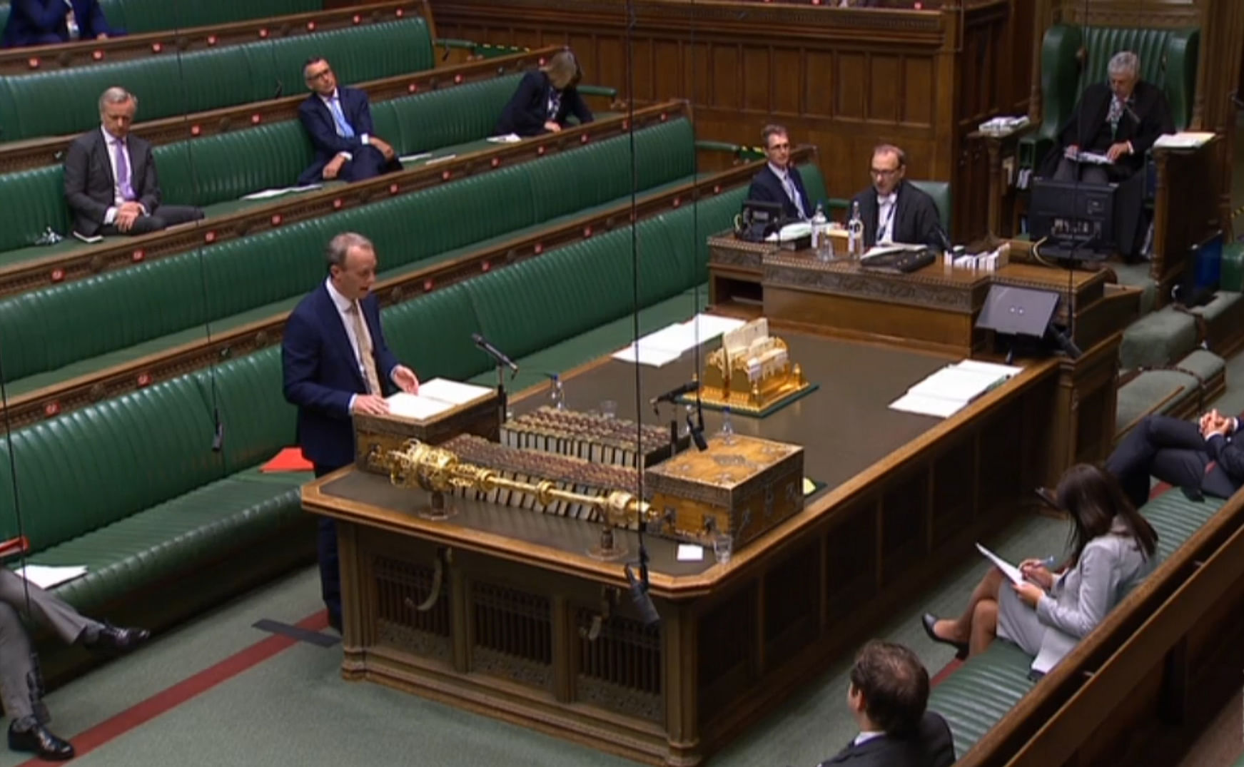 A video grab from footage broadcast by the UK Parliament's Parliamentary Recording Unit (PRU) shows Britain's Foreign Secretary Dominic Raab as he makes a statement on Hong Kong, in the House of Commons in London on July 1, 2020. - Britain on Wednesday extended Hong Kong residents immigration rights after calling China's new security law for Hong Kong a "serious" violation of the former UK territory's autonomy. Foreign Secretary Dominic Raab said Hong Kongers would be offered the right to work or study in Britain for five years. (Photo by Handout / various sources / AFP)