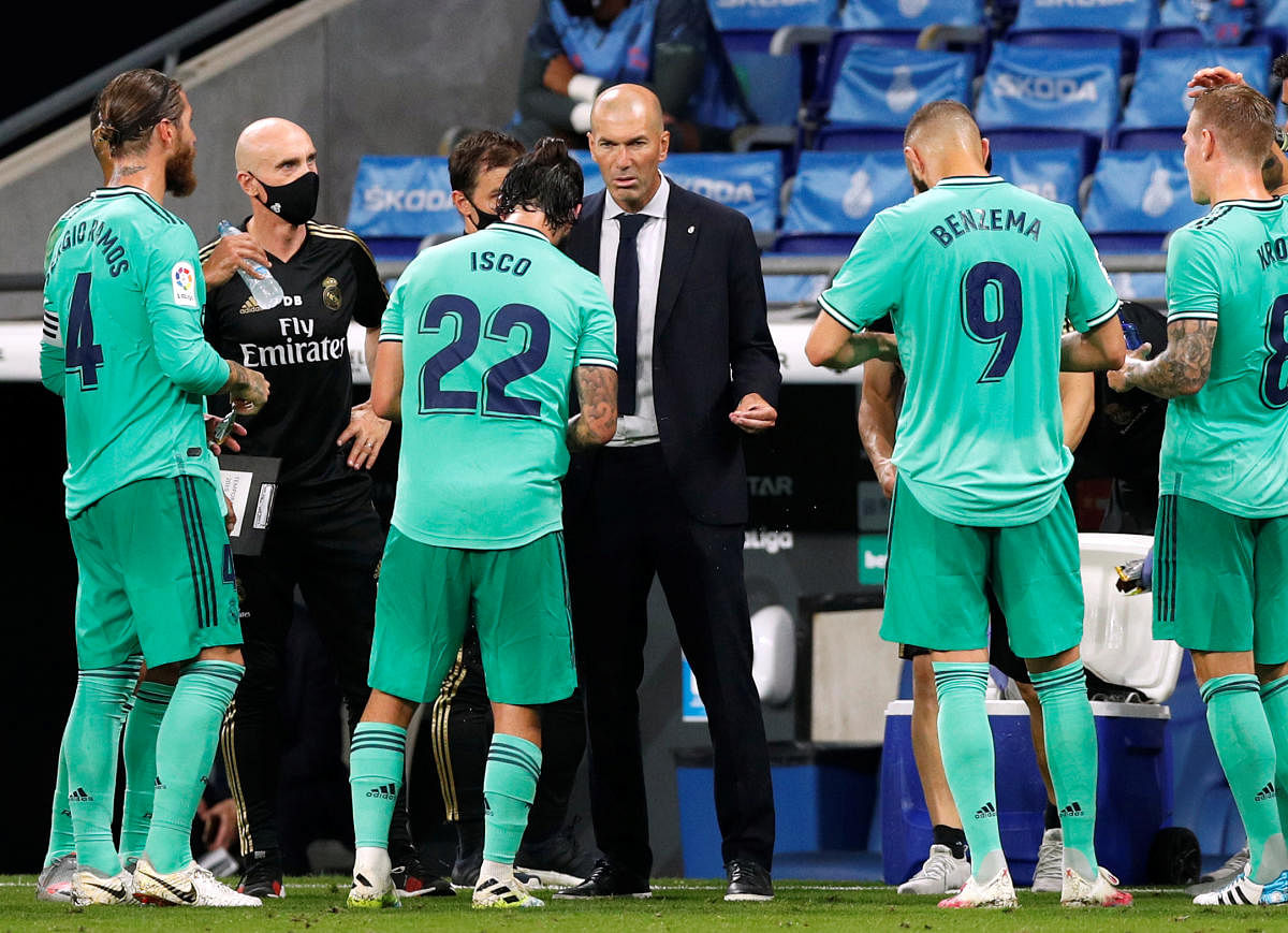 Real Madrid coach Zinedine Zidane with his players. Credit: Reuters