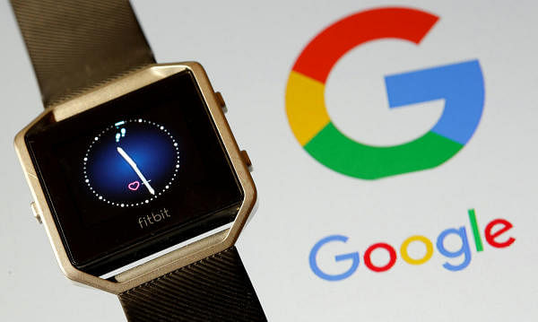 Fitbit Blaze watch is seen in front of a displayed Google logo in this illustration. Credit: Reuters