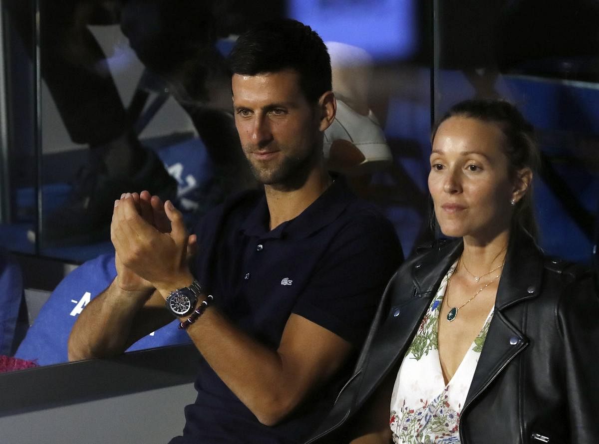Novak Djokovic, left, with his wife Jelena. Credit: AP