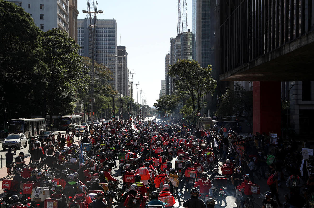 Brazilian delivery workers for Uber Eats and other delivery apps protest as part of a strike to demand better pay and working conditions, amid the coronavirus disease (COVID-19) outbreak, in Sao Paulo, Brazil July 1, 2020. Credit/Reuters Photo
