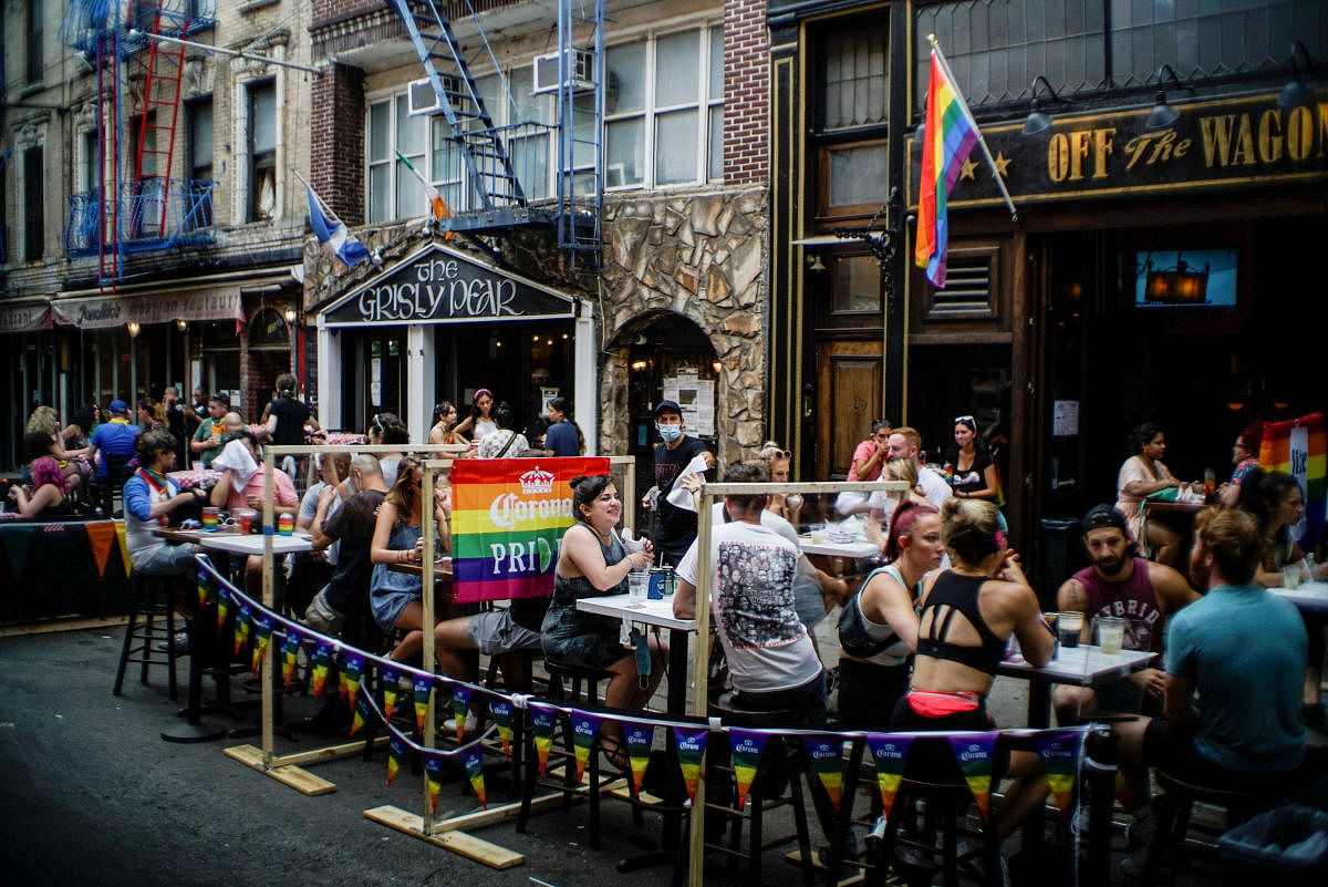 People enjoy al fresco dining at bars and restaurants after a joint LGBTQ and Black Lives Matter march on the 51st anniversary of the Stonewall riots in New York City, New York, U.S. June 28, 2020. Credit/Reuters Photo