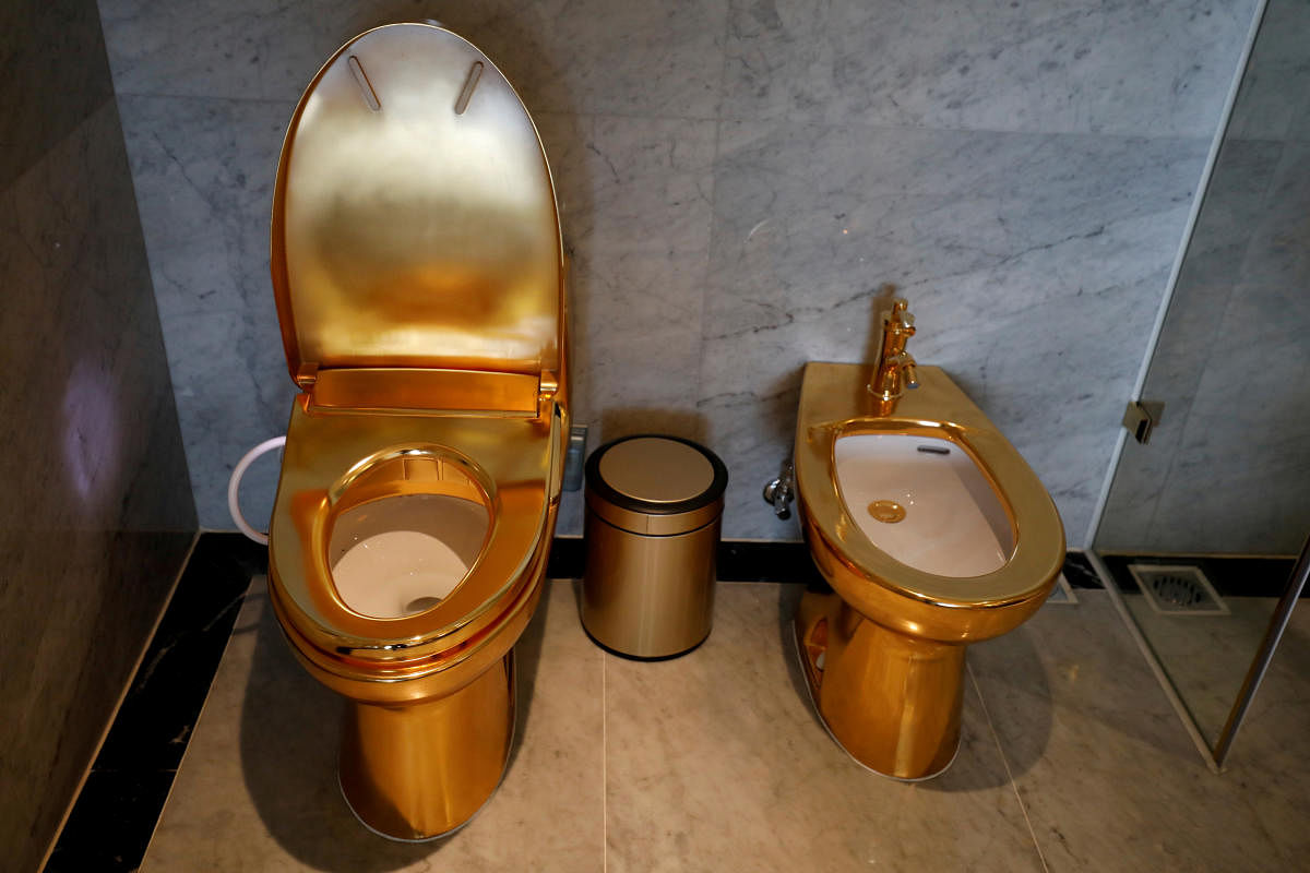 Gold-plated toilets are seen at the newly inaugurated Dolce Hanoi Golden Lake hotel, after the government eased a nationwide lockdown following the Covid-19 pandemic. Credit: Reuters Photo