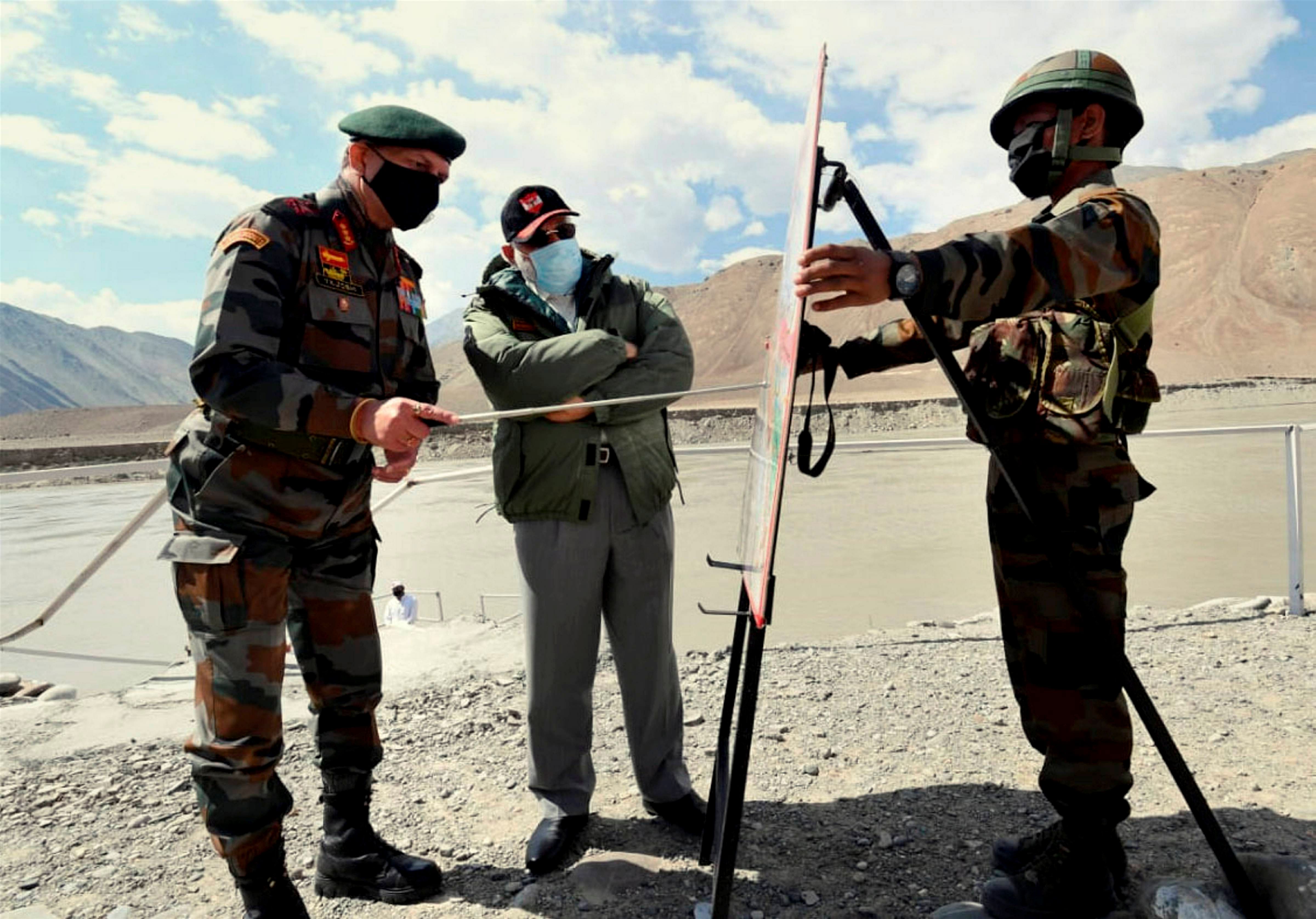 Prime Minister Narendra Modi being briefed by an Army officer in Leh, Friday, July 3, 2020. PM Modi interacted with personnel of the Army, Air Force and Indo-Tibetan Border Police (ITBP). (PIB/PTI Photo)