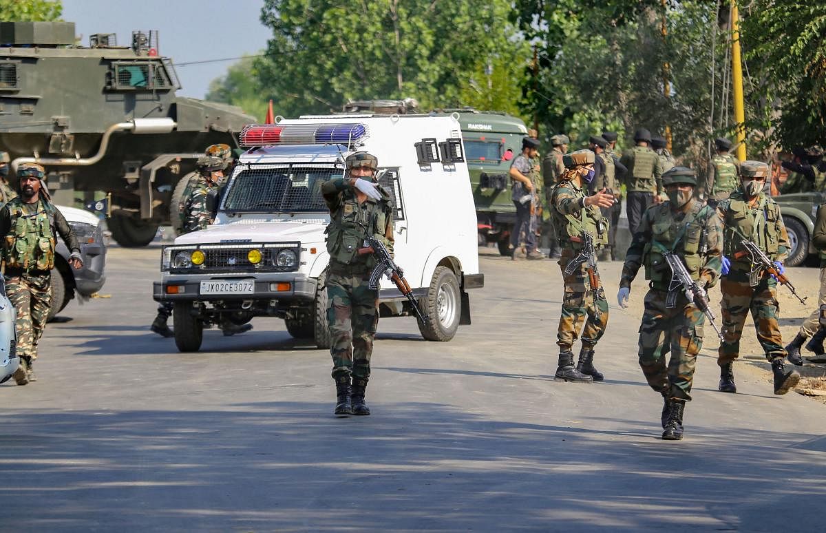 ecurity personnel conduct a search operation after militants opened fire on a naka party of Central Reserve Police Force (CRPF), at Sopore in Baramulla district of Jammu and Kashmir. PTI