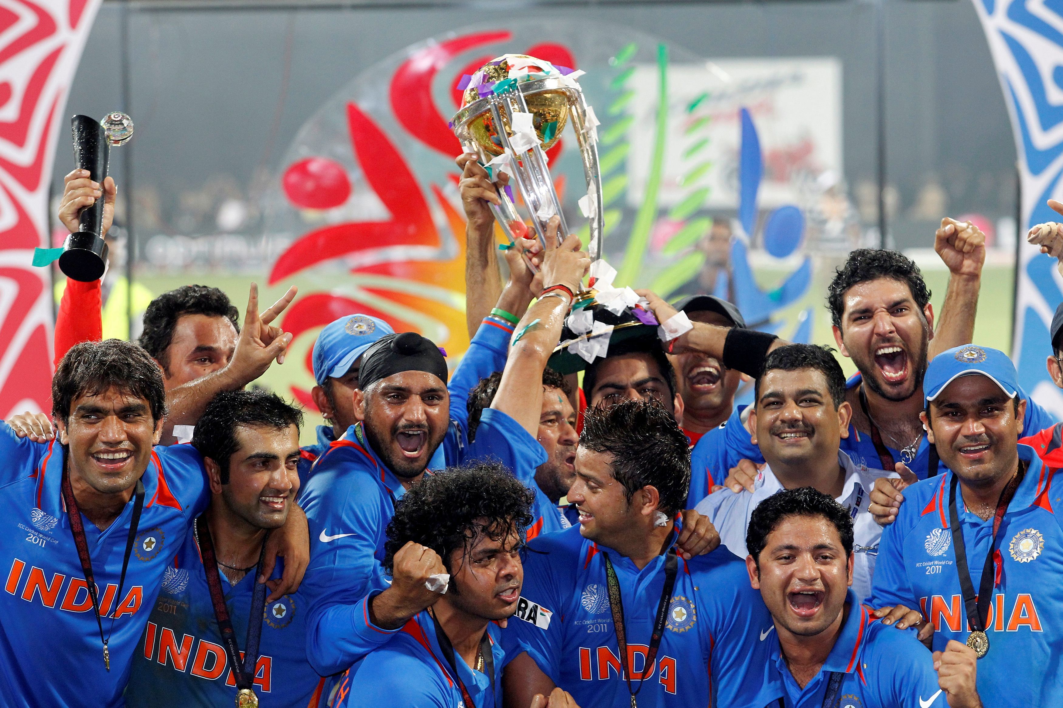 India's players celebrate with their trophy after India won their ICC Cricket World Cup final match against Sri Lanka in Mumbai April 2, 2011. Credit: REUTERS File  Photo