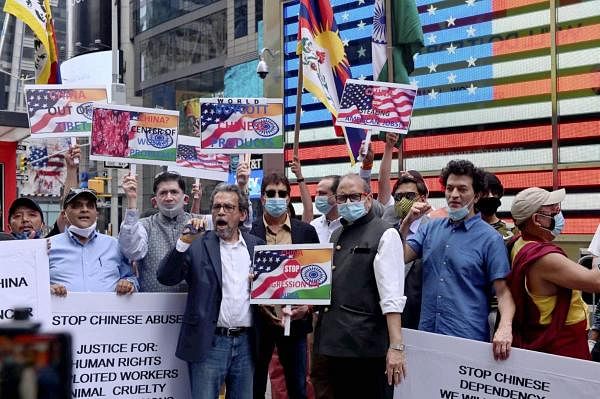 Members of the Indian-American community stage a demonstration against China, demanding to boycott Chinese products, at Times Square in New York, Saturday, July 4, 2020. Credit: PTI Photo