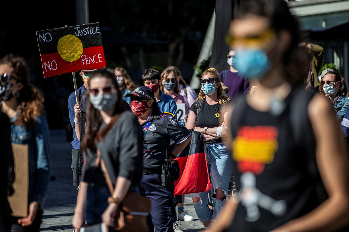 Protesters participate in a Black Lives Matter (BLM) rally, calling for an end to police brutality against Black people in the United States and First Nations people in Australia, in Brisbane, Australia, July 4, 2020. Credit/Reuters Photo