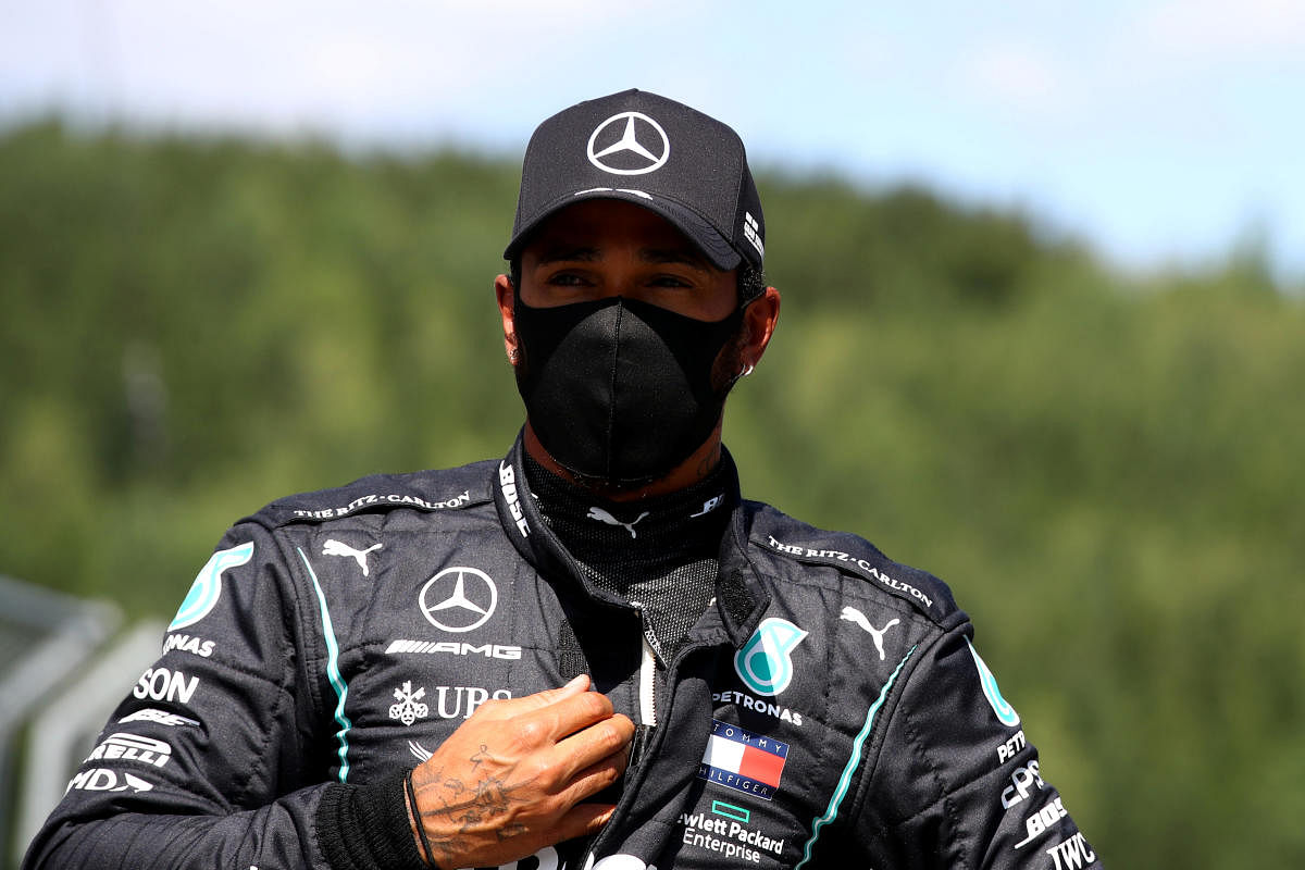 Mercedes' Lewis Hamilton wearing a protective face mask after qualifying, as F1 resumes following the outbreak of the coronavirus disease. Reuters