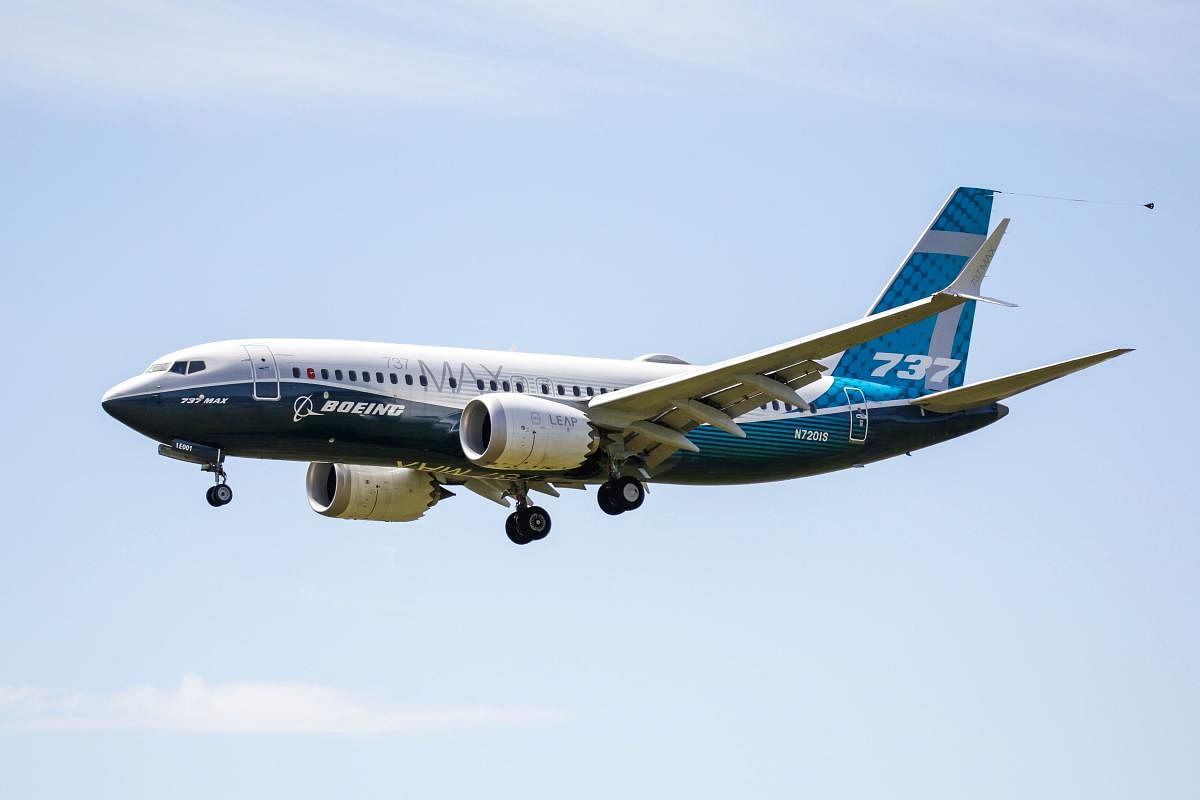  In this file photo taken on June 29, 2020 A Boeing 737 MAX jet comes in for a landing following a Federal Aviation Administration (FAA) test flight at Boeing Field in Seattle, Washington. AFP
