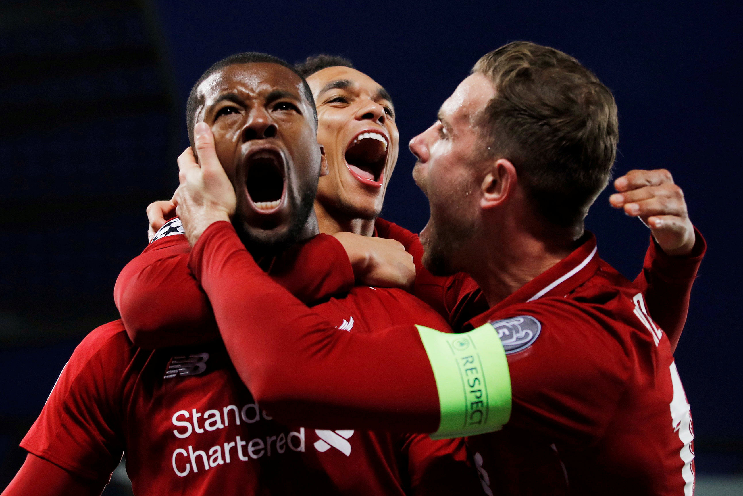 Liverpool's Georginio Wijnaldum celebrates scoring their third goal with Jordan Henderson and Trent Alexander-Arnold. Credits: Reuters Photo