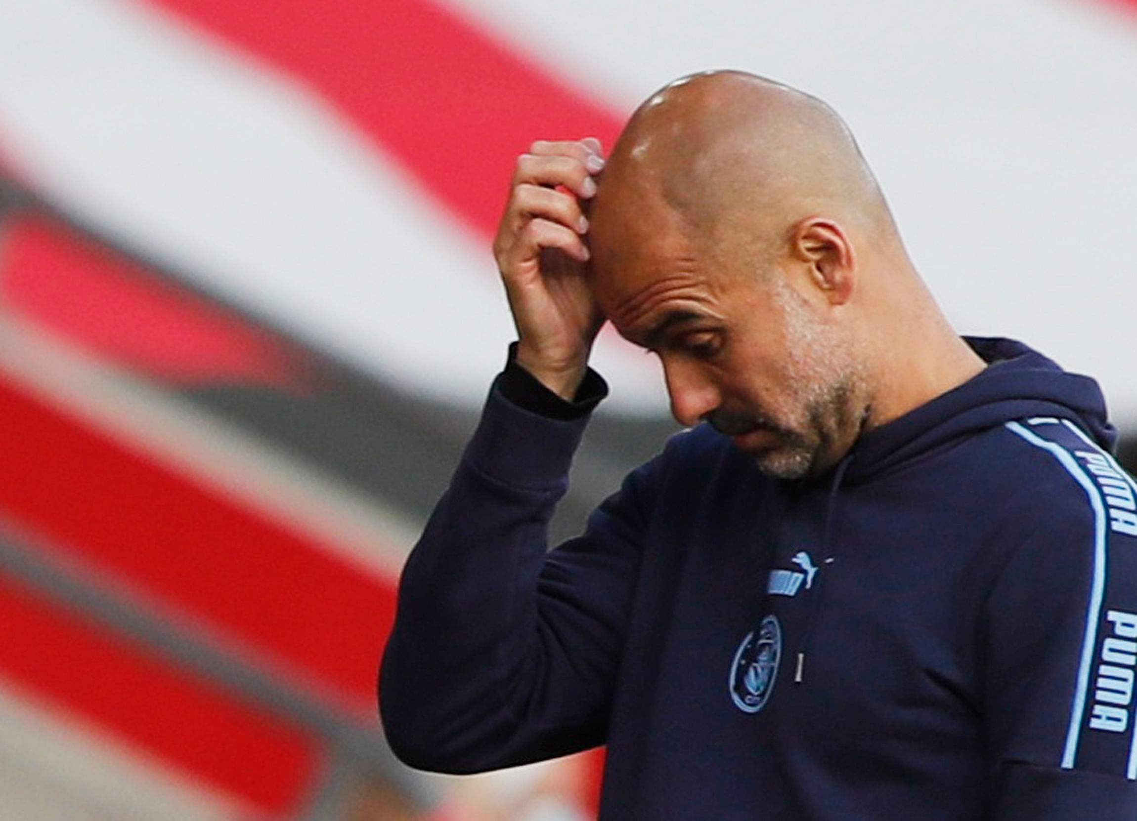 Manchester City manager Pep Guardiola looks dejected. Credits: Reuters Photo