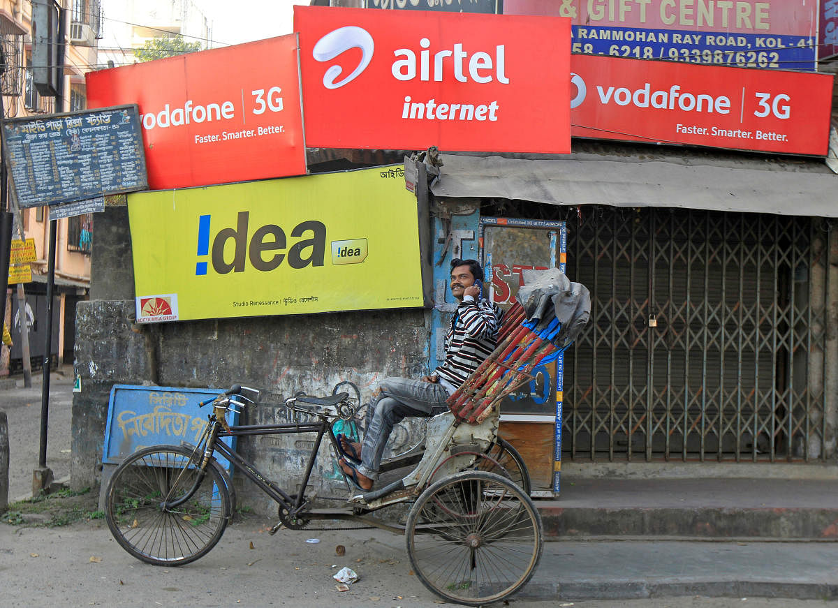 Advertisement billboards belonging to telecom companies. Credit: Reuters Photo