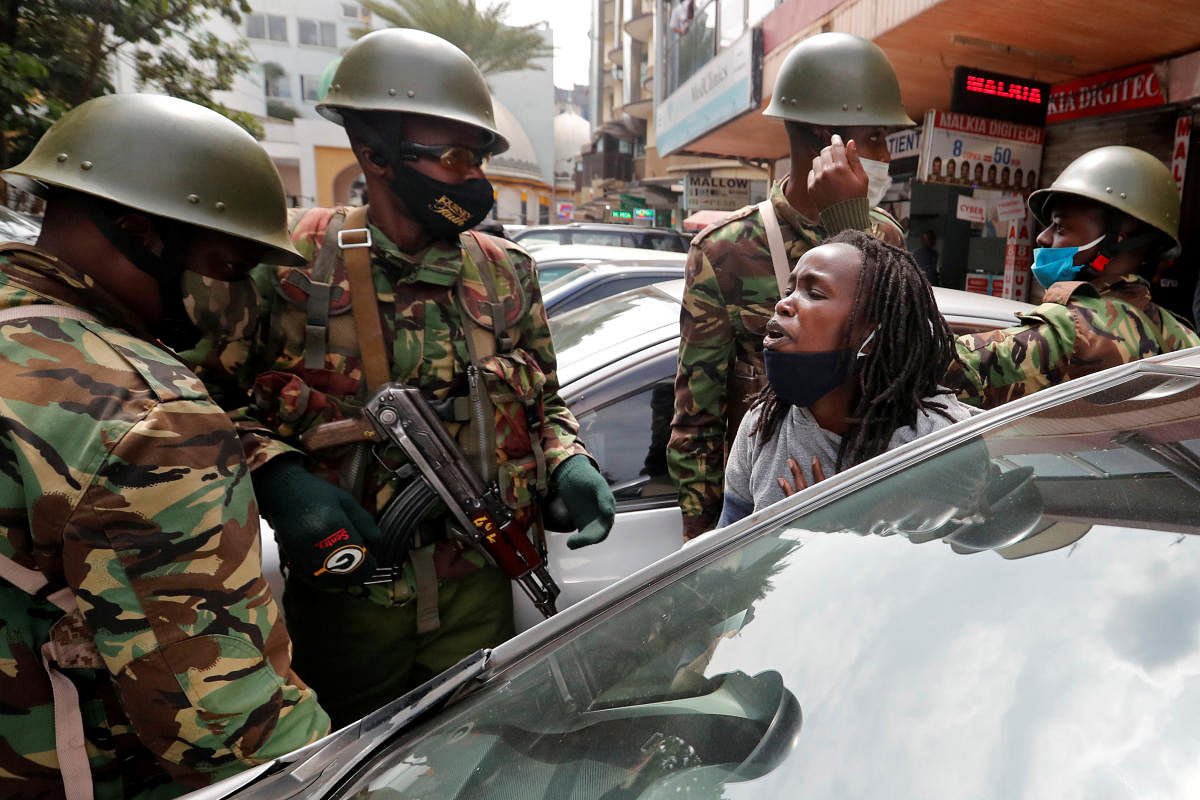 An activist is detained by security forces during anti-government protests dubbed "Saba Saba People's March", in downtown Nairobi, Kenya (Reuters Photo)