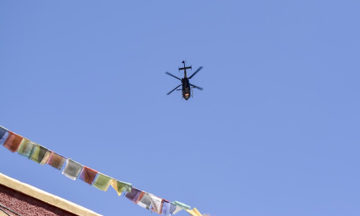  An IAF helicopter flies in the sky, in Leh, Ladakh (PTI Photo)