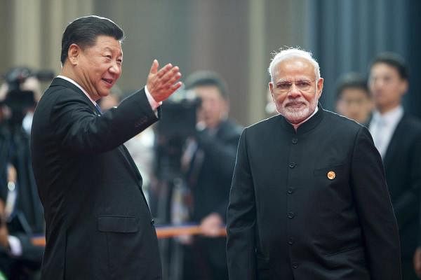 Chinese President Xi Jinping and Indian Prime Minister Narendra Modi. Credit: AP Photo