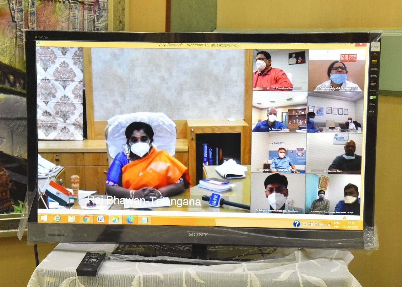 Telangana Governor Tamilisai Soundarrajan in video conference with private hospital managements. Credit: DH Photo