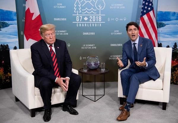 US President Donald Trump (R) and Canadian Prime Minister Justin Trudeau holding a meeting on the sidelines of the G7 Summit in La Malbaie, Quebec, Canada. Credits: AFP Photo