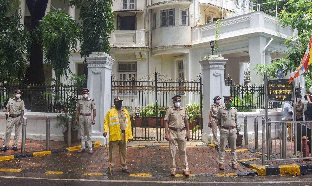 Police personnel stand guard outside Rajgruha, Dr BR Ambedkar's residence, after some unidentified people vandalized it on Tuesday evening, at Dadar in Mumbai, Wednesday, July 08, 2020. Credit: PTI Photo