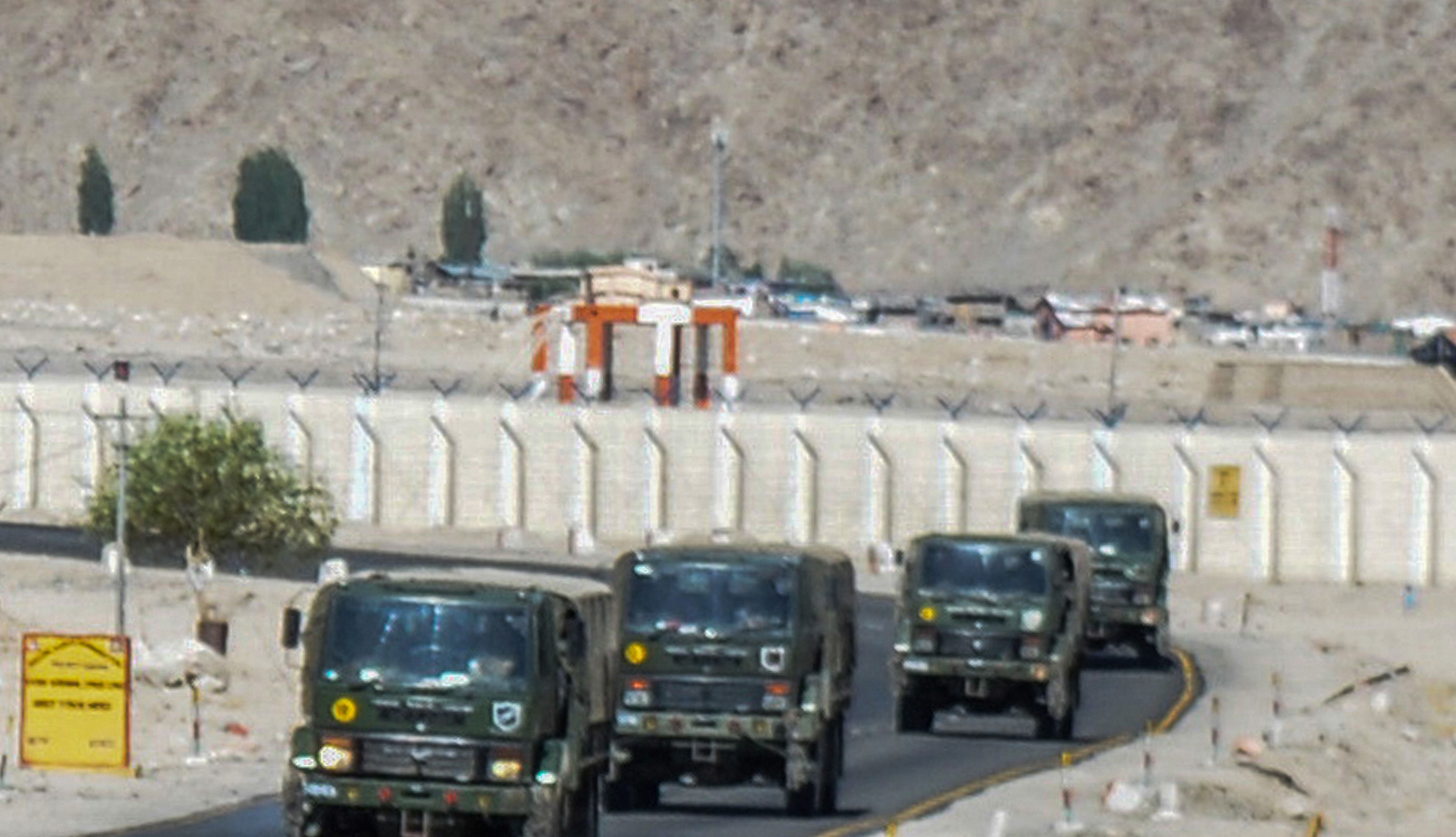 A convoy of Indian army trucks move towards the Line of Actual Control (LAC) in eastern Ladakh, in the backdrop of the current stand-off with Chinese troops, in Leh. Credits: PTI Photo