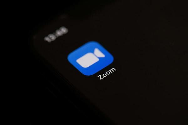 The logo of the social network application Zoom on the screen of a phone. Credit: AFP Photo