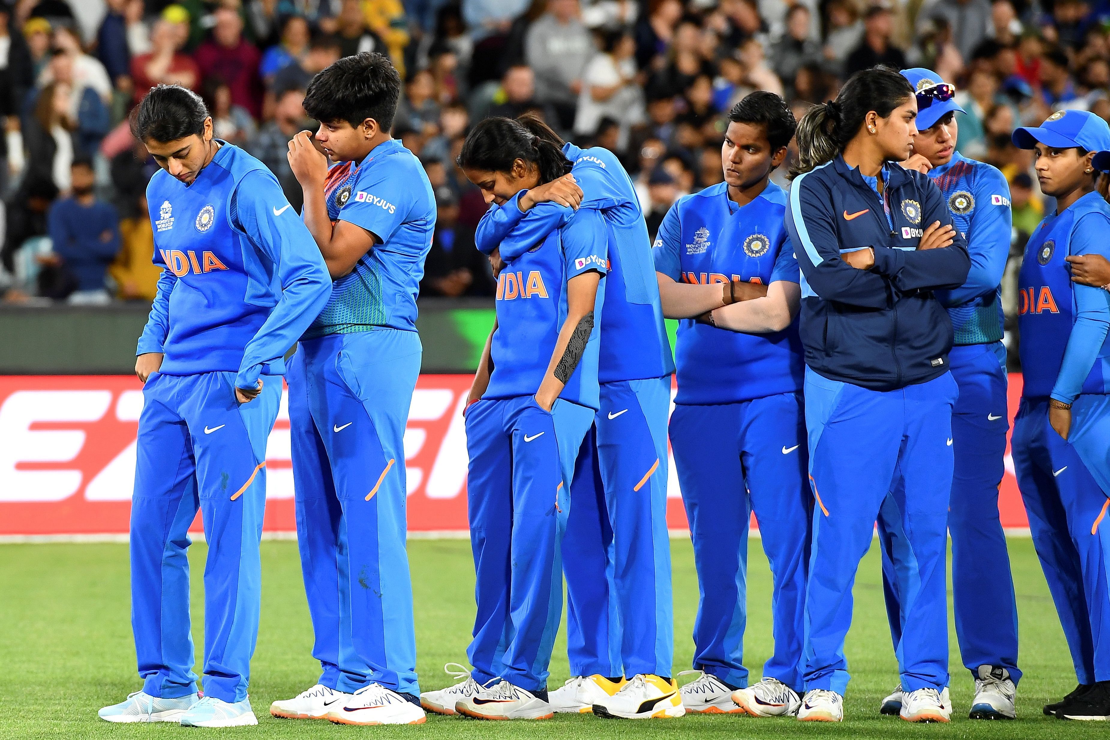 India's players reacts after losing the final against Australia of the Twenty20 women's World Cup cricket match between Australia and India in Melbourne on March 8, 2020. (Photo by AFP)