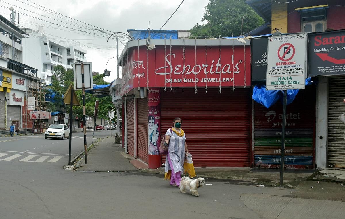 A local market wears a near deserted look after the authorities imposed strict lockdown following the rise in Covid-19 cases, in Thane. File Photo. Credit: PTI Photo