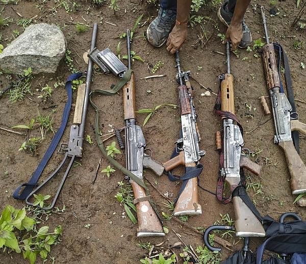 Arms and ammunition recovered after four Maoists were gunned down in Odisha. Credit: PTI Photo